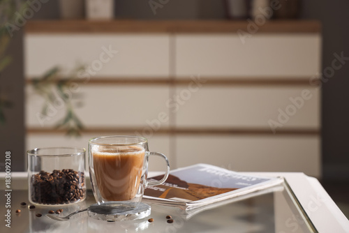 Glass cup of cappuccino wit...