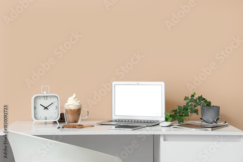 Workplace with blank laptop...
