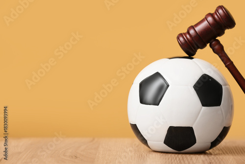 Judge's gavel with soccer b...