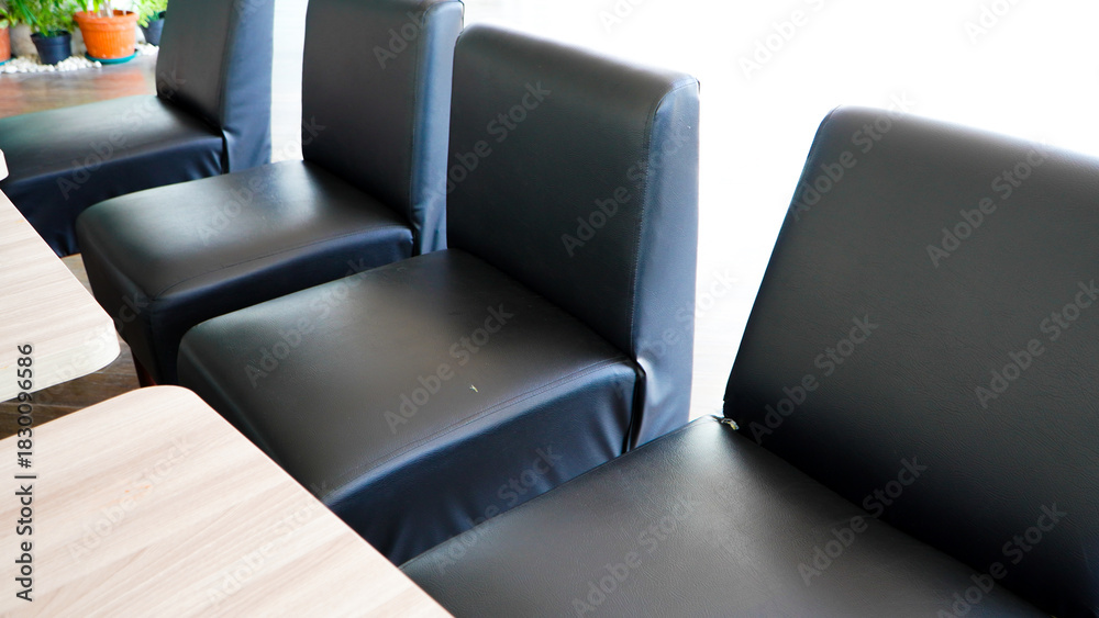 Fototapeta premium chairs in a conference room. Empty Black red outdoor chair in cafe at the mall. With metal black table. At the foodcourt for lunch.