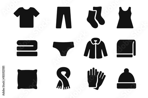 Laundry Icon Set. Household laundry. Solid icon set of household laundry: shirt, pants, socks, dress, towel, underwear, jacket, blanket, pillowcase, scarf,