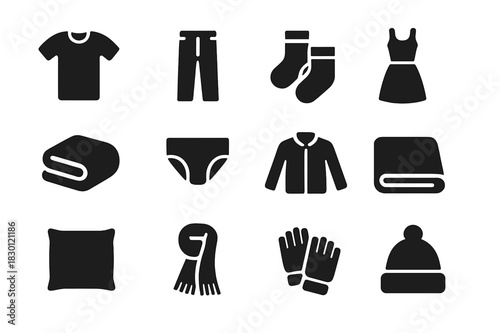 Laundry Icon Set. Household laundry. Solid icon set of household laundry: shirt, pants, socks, dress, towel, underwear, jacket, blanket, pillowcase, scarf,