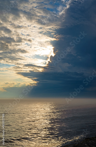 Tumultuous Clouds Over a Lake in the Evening