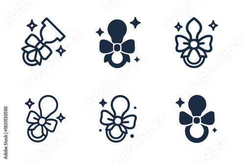Baby Shower Logos. Baby shower party ideas and decorations. Icon set. Set Logo of baby shower party ideas and decorations: pacifier with ribbon and sparkles.