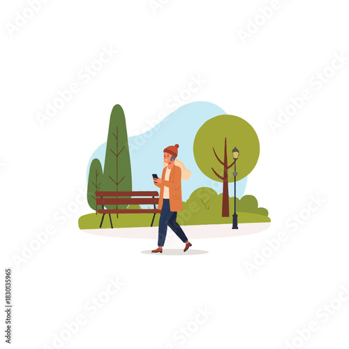 Woman strolling through a tranquil park with a mobile phone, enjoying a peaceful day outdoors