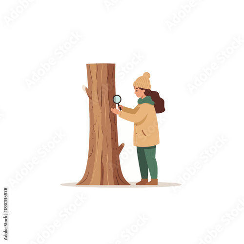 Young explorer intently examines tree bark with magnifying glass seeking forest nature details and