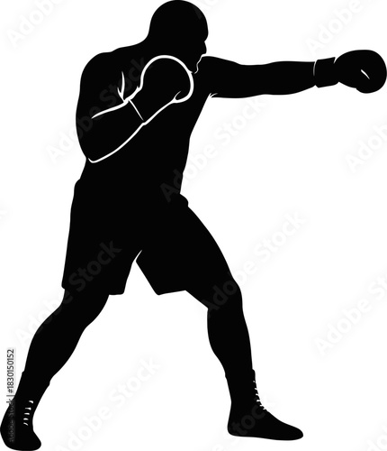 Silhouette of a boxer throwing a punch with determination and strength in a fighting stance ready to compete