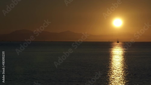 Commercial Fishboat Returning at Sunset 4K UHD.A fishboat with fresh caught fish returning to Steveston Harbor at sunset. Richmond, British Columbia. 4K UHD.
