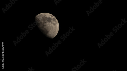 Moon in the night sky, closeup of a lunar eclipse.