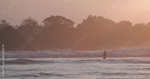 Public town beach in Weligama at sunset, Sri Lanka