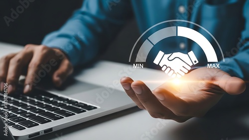Business partnership and agreement concept visualized with a handshake icon and progress bar on a laptop