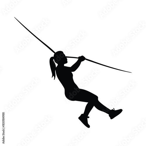 Silhouette of a woman throwing a javelin during a track and field competition.
