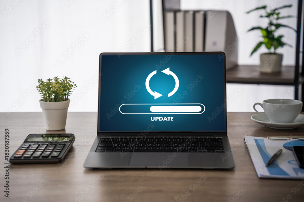 Obraz na płótnie Update software application Person using laptop with software update progress interface and security, technology update digital transformation concept