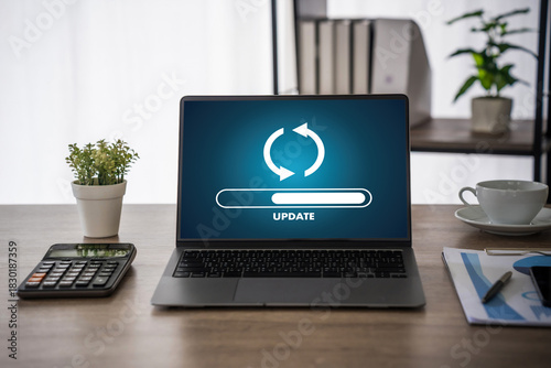 Obraz na plátně Update software application Person using laptop with software update progress interface and security, technology update digital transformation concept