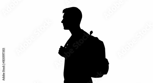 Side profile silhouette of a young man carrying a backpack.