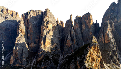 Dramatic Alpine Mountain Peaks and Rock Cliffs with Strong Sunlight Isolated
