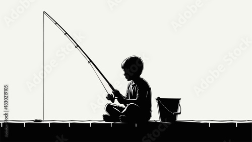 Silhouette of a young boy fishing with a rod and bucket on a dock.