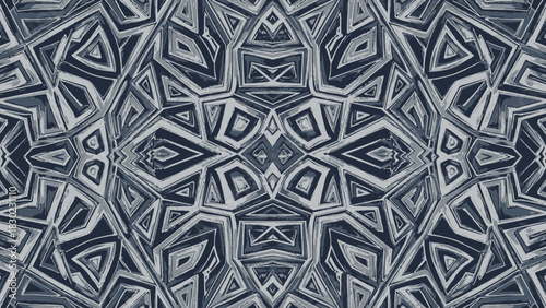 Abstract geometric pattern with intricate shapes and lines in shades of gray.