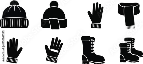 Set of black silhouette icons representing winter clothing accessories like hats, gloves, scarf, and boots, isolated on white background