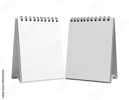 Two blank, spiral-bound desk calendars on a black backdrop