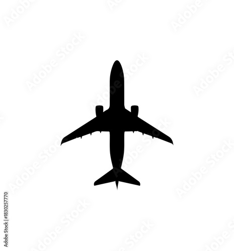 Dramatic silhouette of commercial airplane soaring high, perfect for travel and transportation themes