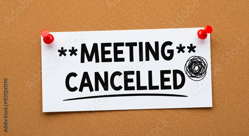 Meeting cancelled announcement pinned to a corkboard with red push pins