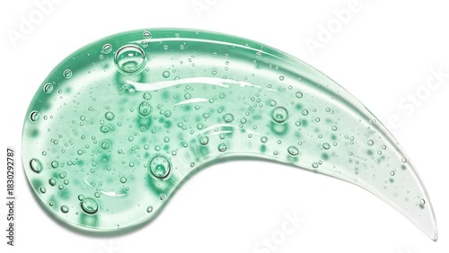 A close-up view of a translucent, green gel with bubbles.