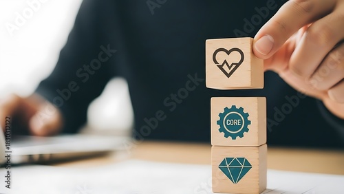 Businessman building a company foundation with core values of health and quality