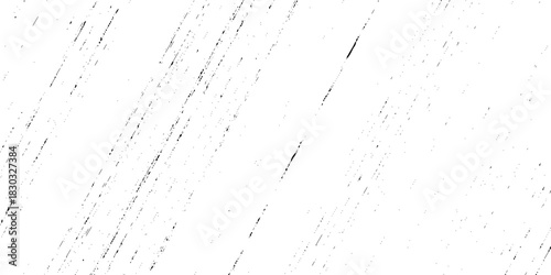 Abstract texture grunge made of diagonal streaks and distressed lines, black ink on a white background. grunge scratch patterns, chaotic linear noise. dirty monochrome pattern of the old worn surface.