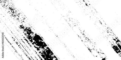Abstract texture grunge made of diagonal streaks and distressed lines, black ink on a white background. grunge scratch patterns, chaotic linear noise. dirty monochrome pattern of the old worn surface.
