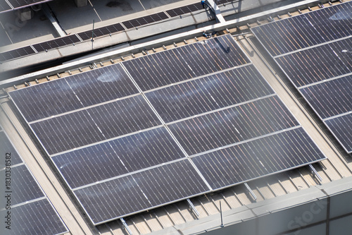 Aerial view of urban rooftop solar panel installation sustainable energy in industrial settings