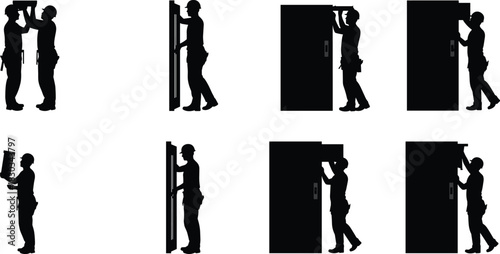Silhouette of workers installing door frame, construction process, handyman fixing and aligning doorway, carpenter mounting interior sliding door panel