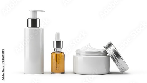 Skincare products arranged on white surface, showing containers with lotion, serum, and cream.