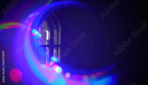 Abstract composition featuring vibrant light flares, shapes, and a dark background.