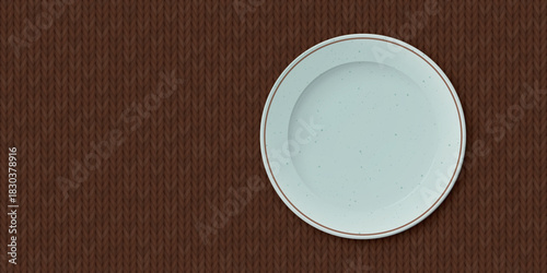 Top view of empty green mint circle dish place on brown tablecloth background