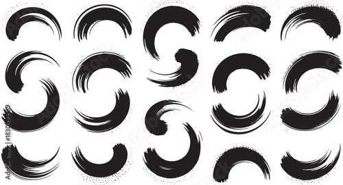 Black ink brush strokes forming curved shapes and circles