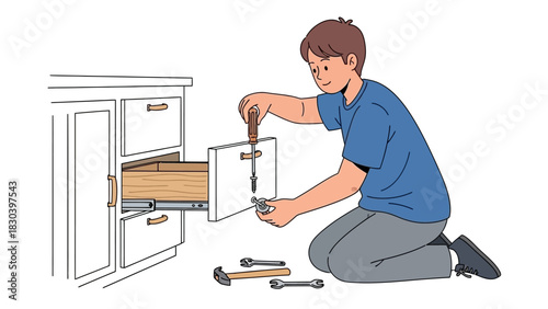 A young boy skillfully assembles a new cabinet, attaching a handle to the drawer in a DIY home project