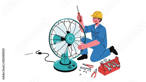 Person in yellow hard hat repairing an electric fan with tools spread out on the floor around him