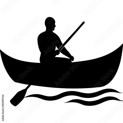 Silhouette of a person rowing a canoe on wavy water