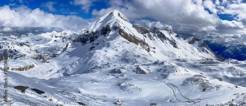 Beautiful view on snowy mountain range and ski slope in Austria Alps, Obertauern at winter