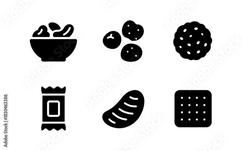 Snack icons set: silhouette designs of nuts, chips, and biscuits