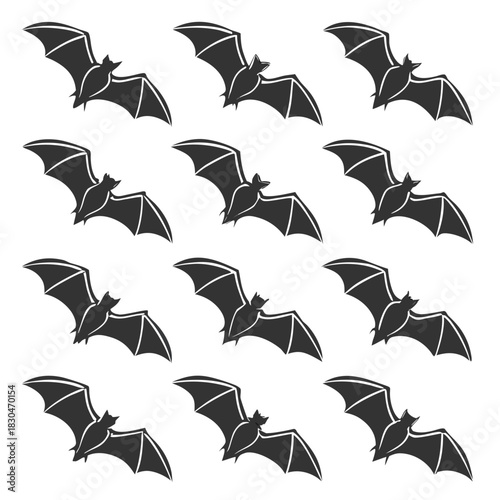 Vector illustration of a pattern of twelve black silhouette flying bats for halloween or spooky design