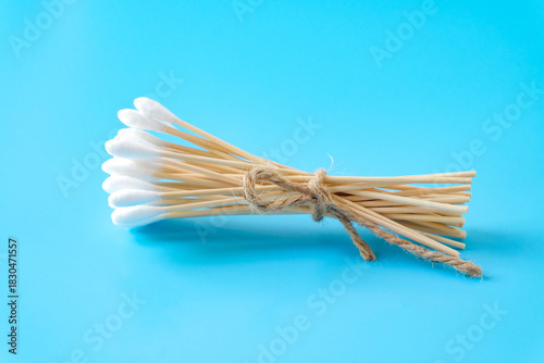 A swab clean health care top view,cotton bud on blue background.