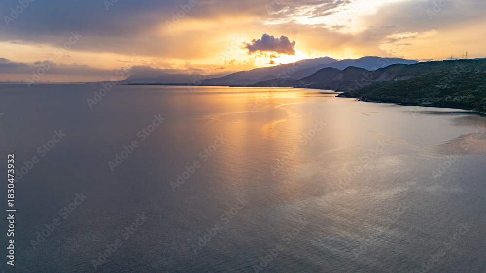 Fototapeta premium Aerial Drone View of Sunset over Gulf of Corinth, Central Greece, viewed from Skaloma