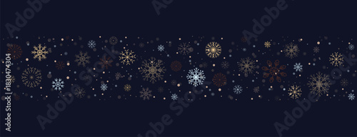Winter border with snowflakes, sparkling pollen and snow on dark blue background. Winter snow line. Luxurious festive background. For christmas, new year and seasonal projects