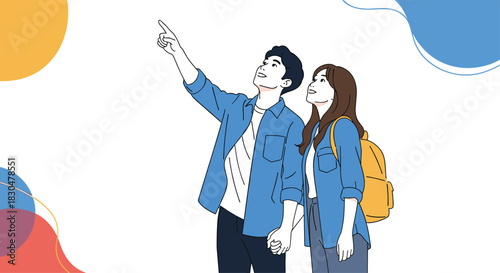 A joyful young couple holding hands, looking up and pointing with curiosity and wonder at an unseen element in the clear sky.