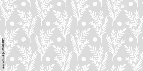 Seamless pattern on a gray background with hand-drawn winter plants and berries. Christmas plant pattern with silhouettes of evergreen plants and berries, for fabric design, packaging, winter decor.