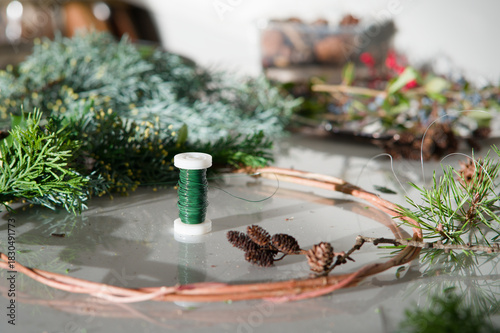 Green floral wire used to do Christmas wreath