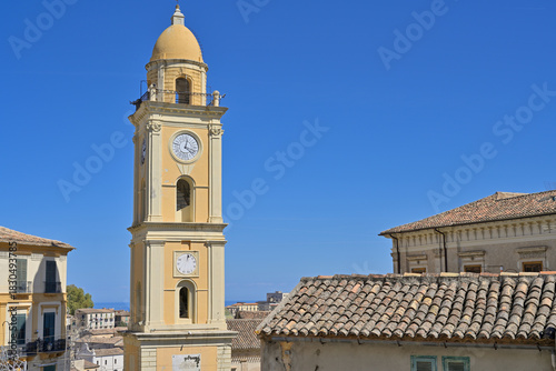 Tableau sur toile Rossano Torre dell'Orologio standing tall under blue sky