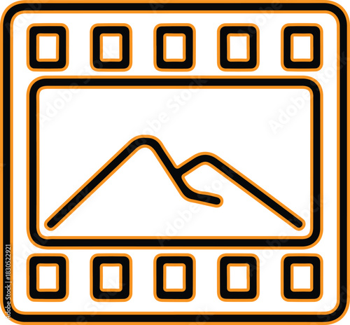 Film strip with mountain landscape inside frame